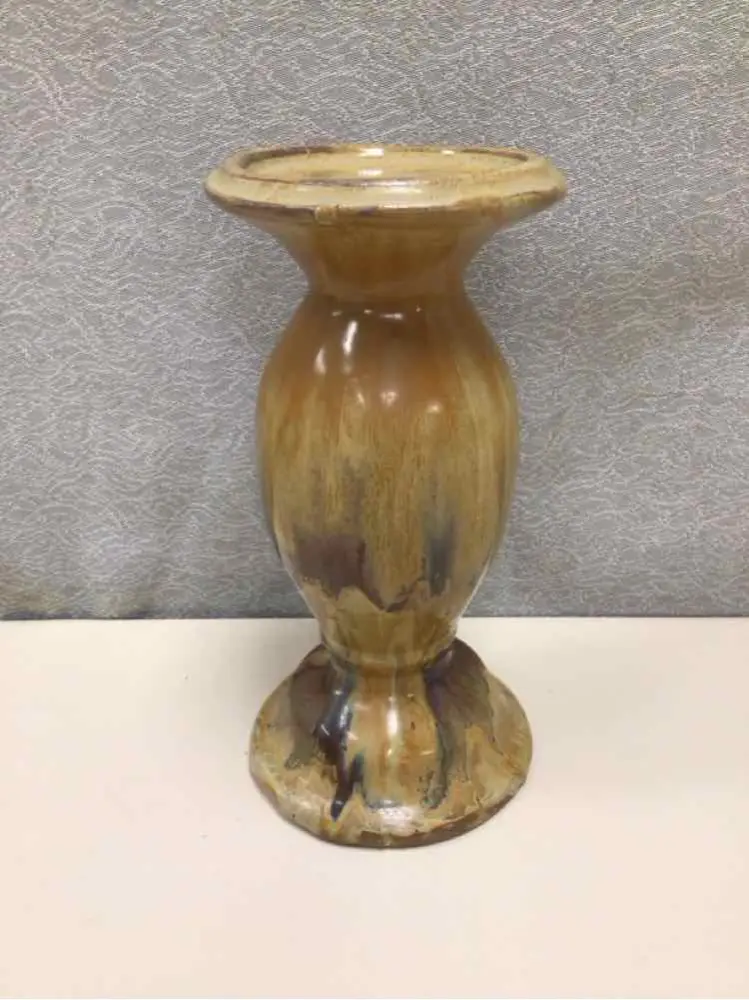 TAN POTTERY CANDLESTAND