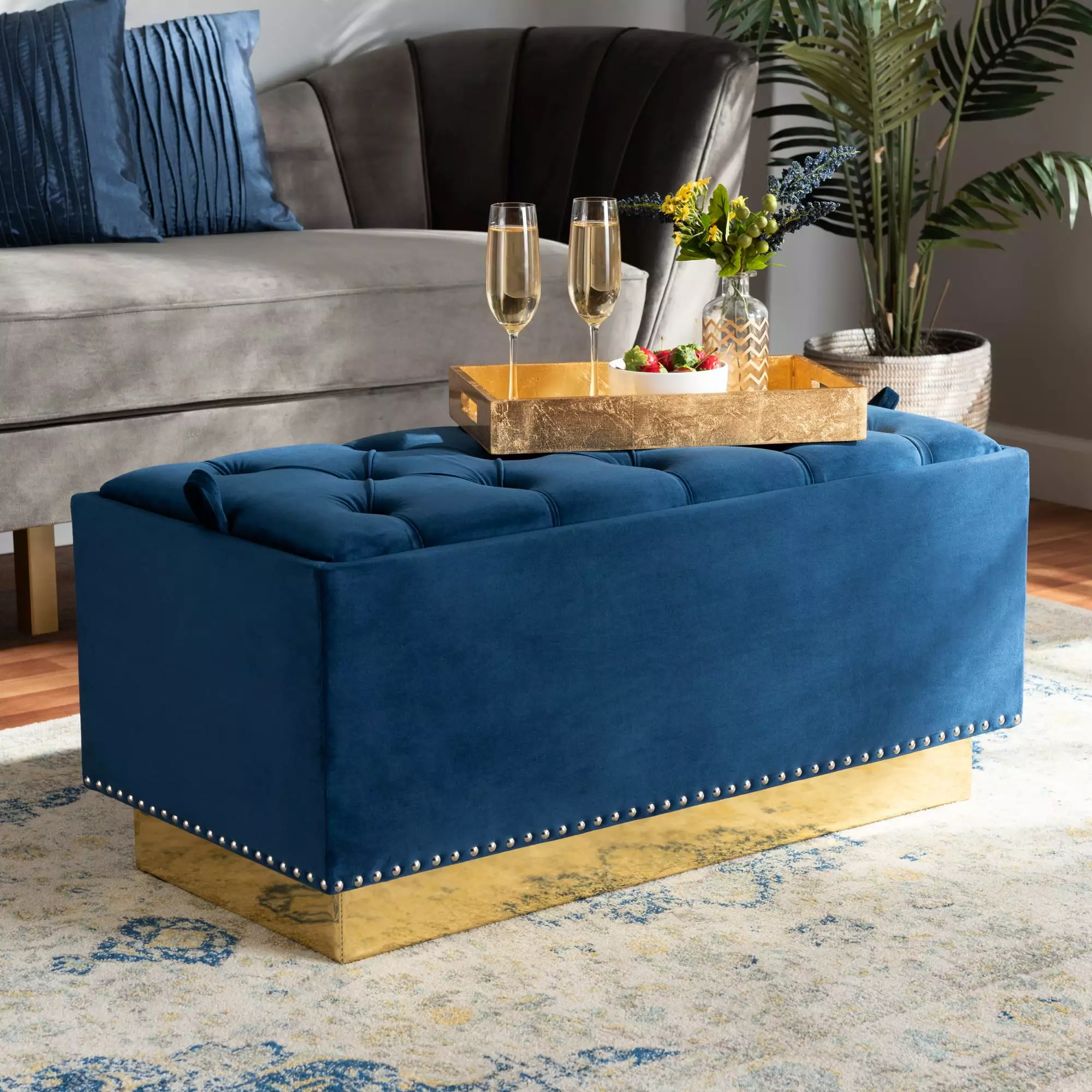 Baxton Studio Powell Navy Blue Velvet Storage Ottoman Gold PU Leather Ottomans